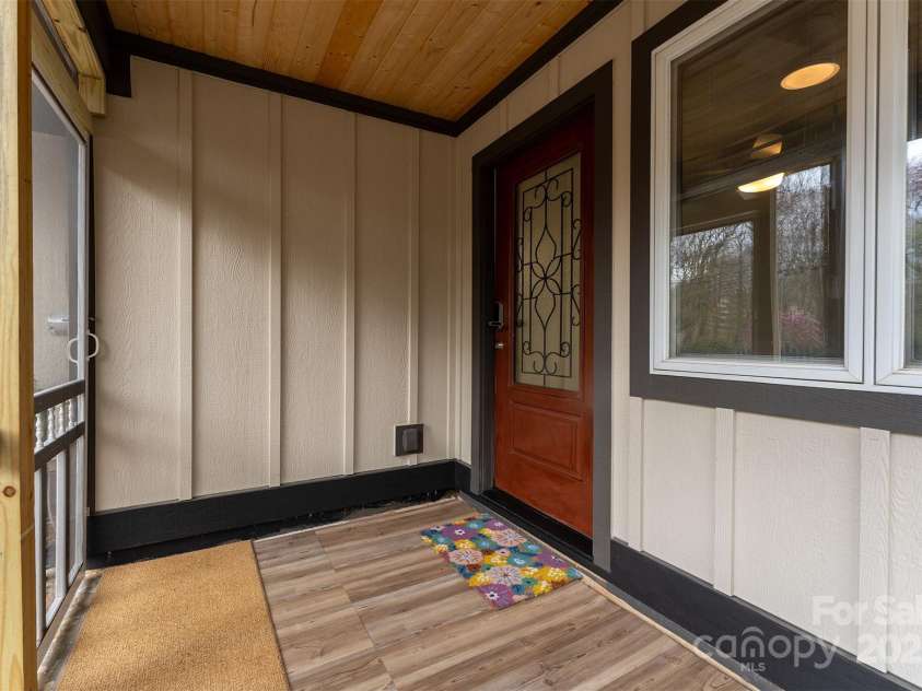 605 Rhododendron Avenue, Black Mountain, NC 28711.  MLS# CAR4242115, YatesRealty ID 7827. Screened in Front Porch