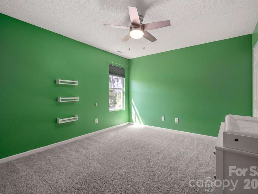 6934 Tanners Creek Drive, Huntersville, NC 28078.  MLS# CAR4303299, YatesRealty ID 7827. Bedroom #4 with new ceiling fan