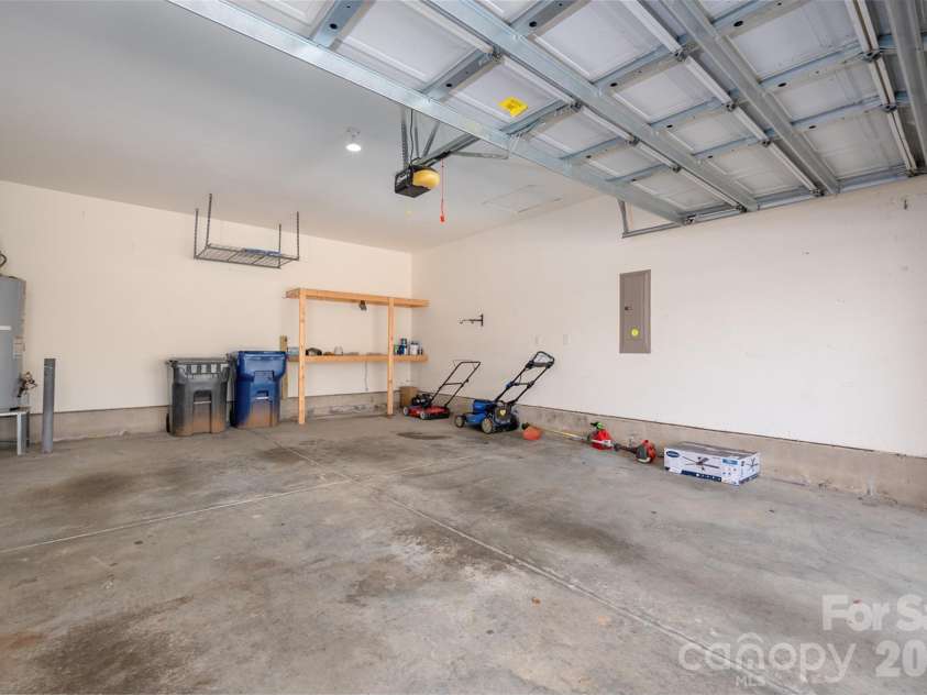 6934 Tanners Creek Drive, Huntersville, NC 28078.  MLS# CAR4303299, YatesRealty ID 7827. Full 2 car garage with extended workspace area