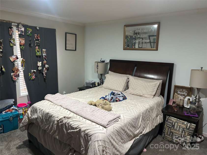 415 Rovingwood Drive, Waynesville, NC 28786.  MLS# CAR4317196, YatesRealty ID 783. Primary bedroom