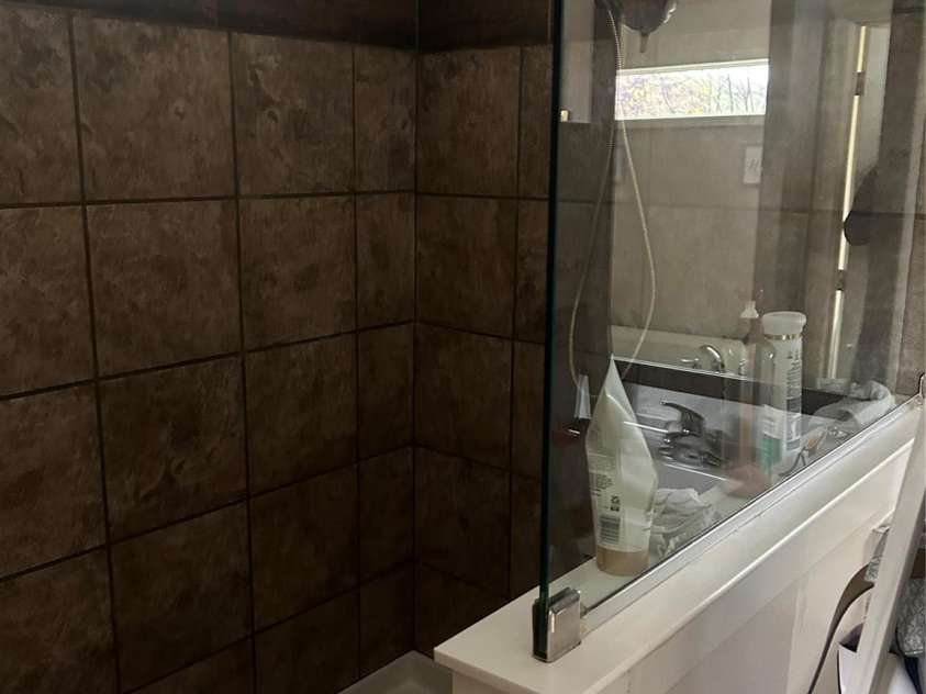 415 Rovingwood Drive, Waynesville, NC 28786.  MLS# CAR4317196, YatesRealty ID 783. Primary bedroom bath