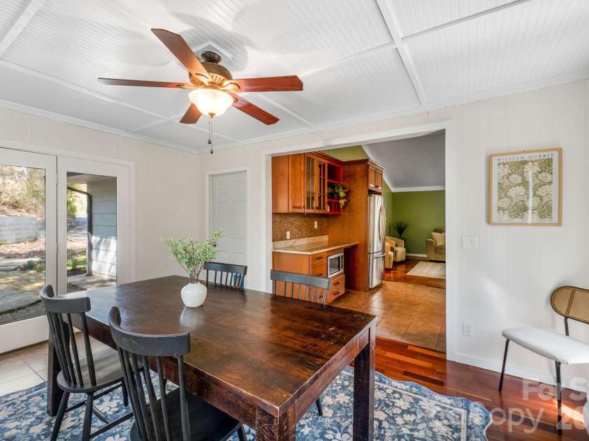18 Peaceful Valley Lane, Flat Rock, NC 28731.  MLS# CAR4346213, YatesRealty ID 7830. Doing room right off kitchen.