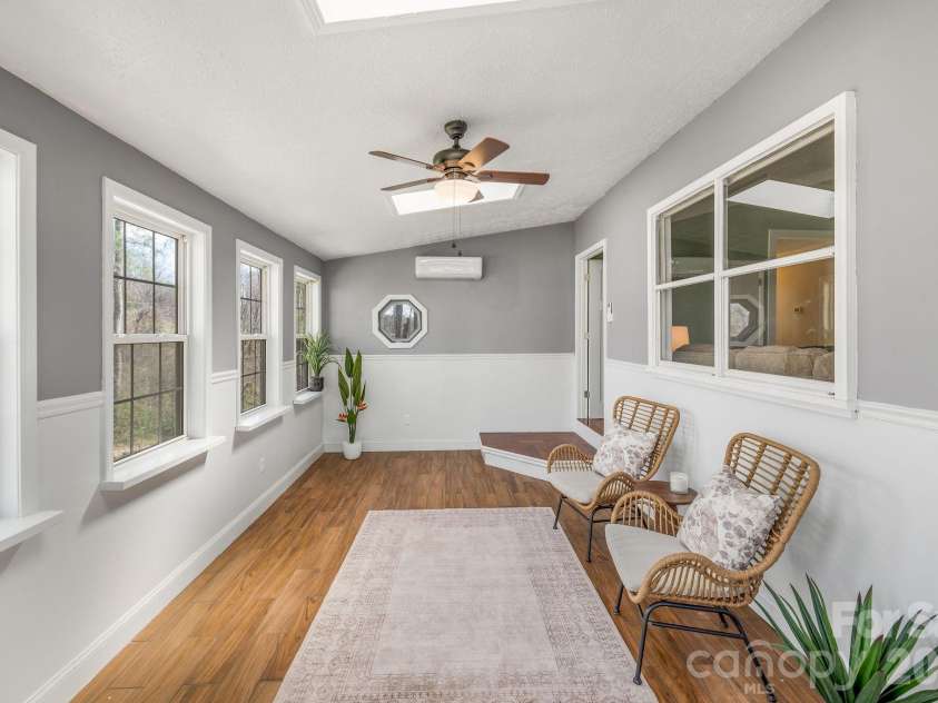 18 Peaceful Valley Lane, Flat Rock, NC 28731.  MLS# CAR4346213, YatesRealty ID 7830. Four season as the mini split keeps it both warm and cool.