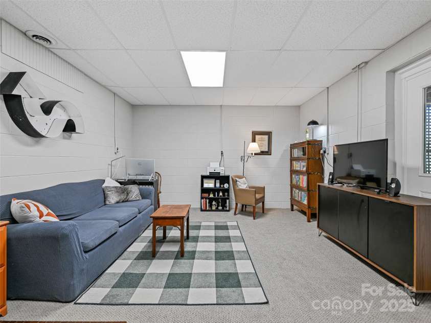 18 Thousand Oaks Boulevard, Fairview, NC 28730.  MLS# CAR4250444, YatesRealty ID 7832. Basement Office