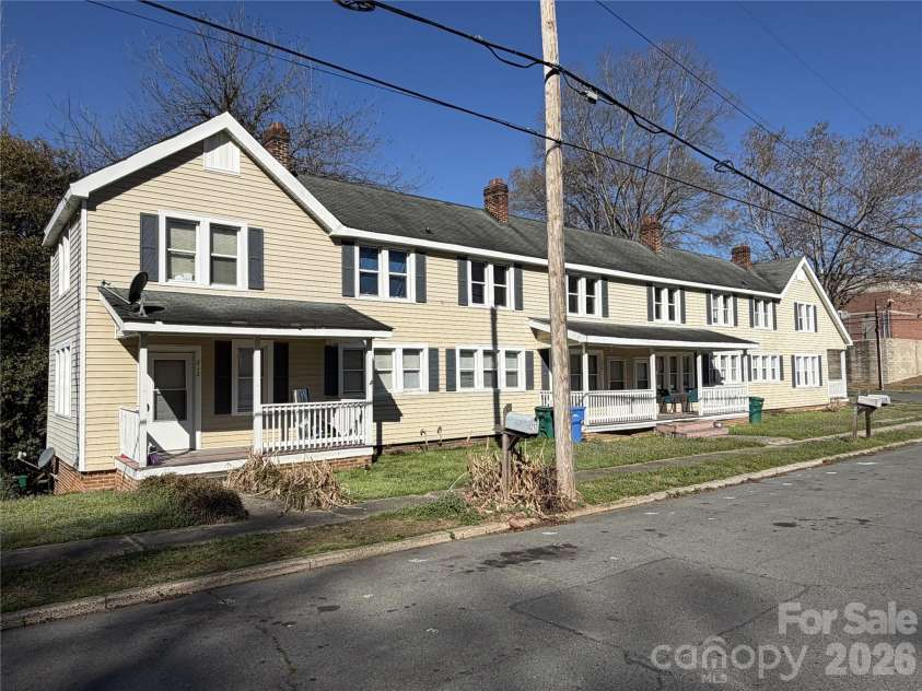 208 3rd Street, Albemarle, NC 28001.  MLS# CAR4358248, YatesRealty ID 7833. High-margin multifamily anchor in the CBD—modern curb appeal meets a zero-drag layout, engineered to eliminate common area costs and maximize your net cash flow