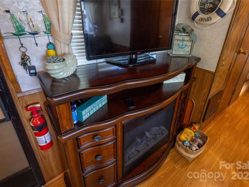 171 Holly Harbor Trail, Mount Gilead, NC 27306.  MLS# CAR4309223, YatesRealty ID 7834. Electric Fireplace