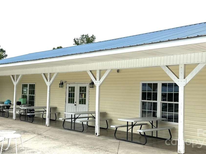 171 Holly Harbor Trail, Mount Gilead, NC 27306.  MLS# CAR4309223, YatesRealty ID 7834. Pool side Arcade