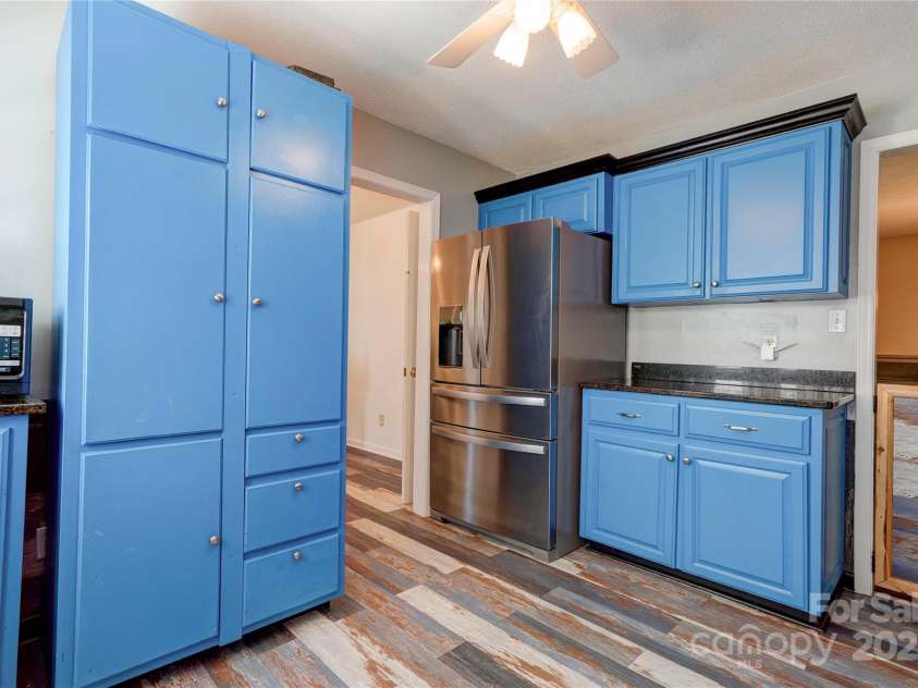 1033 College Avenue, Shelby, NC 28152.  MLS# CAR4314488, YatesRealty ID 7835. Kitchen - refrigerator remains.