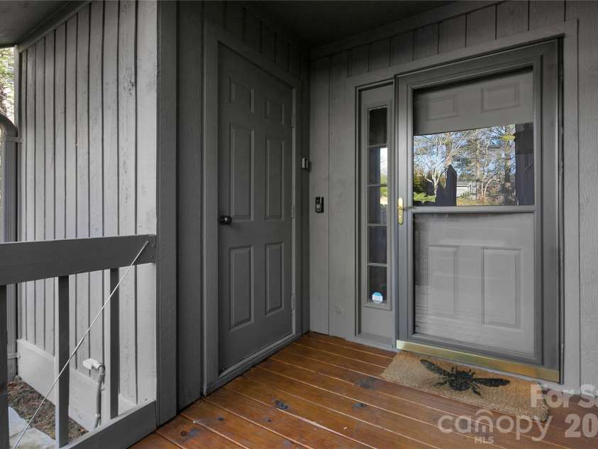 150 Racquet Club Villas Drive, Sapphire, NC 28774.  MLS# CAR4346144, YatesRealty ID 7838. 