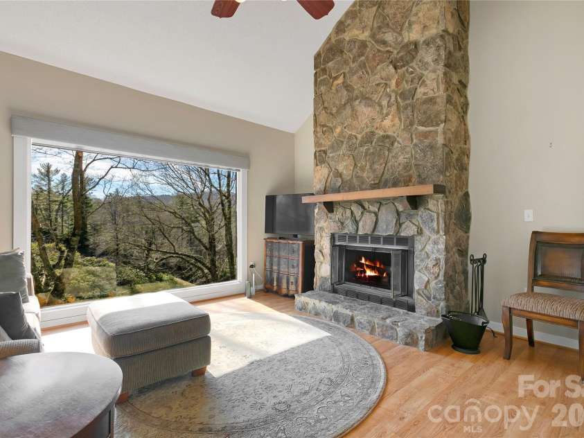 150 Racquet Club Villas Drive, Sapphire, NC 28774.  MLS# CAR4346144, YatesRealty ID 7838. Lots of light and great view