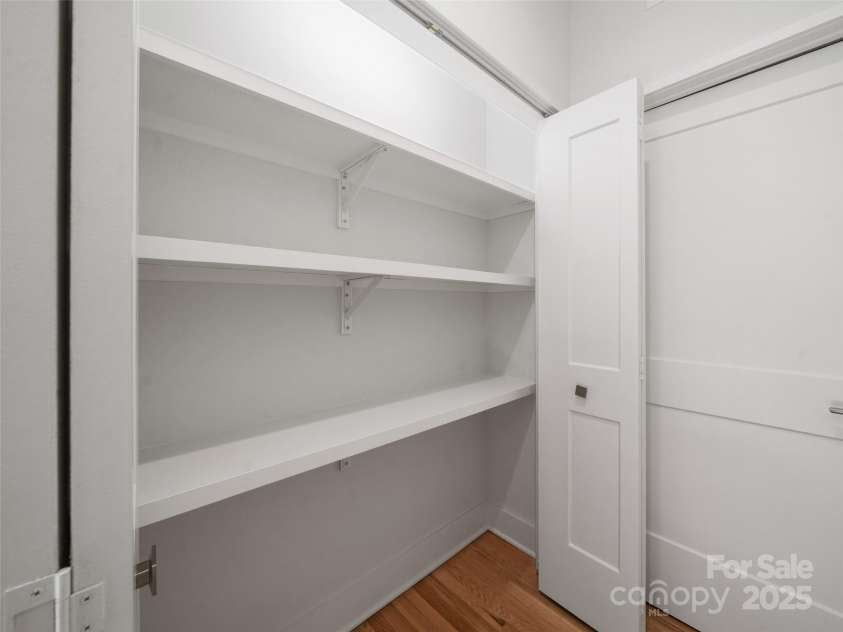 43 Skyvue Court, Saluda, NC 28773.  MLS# CAR4199637, YatesRealty ID 7845. Pantry beside the kitchen