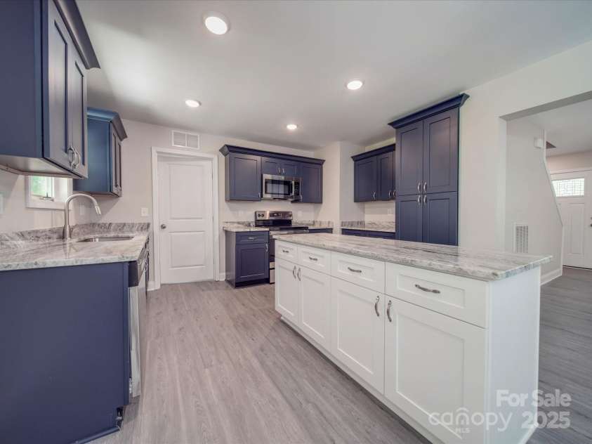 292 Manchester Road, Mount Gilead, NC 27306.  MLS# CAR4270794, YatesRealty ID 7846. Large Kitchen Island