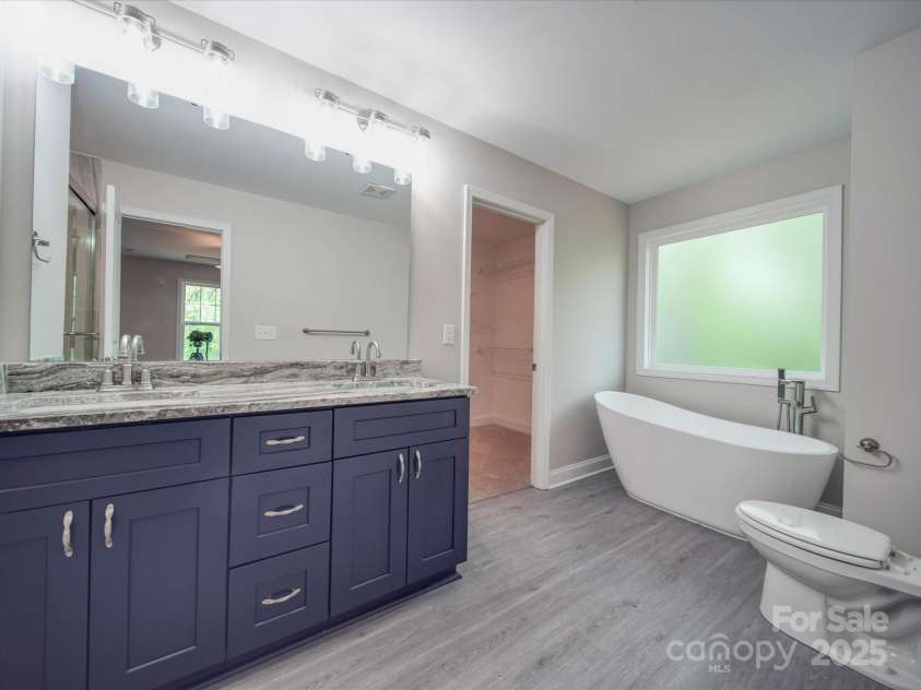 292 Manchester Road, Mount Gilead, NC 27306.  MLS# CAR4270794, YatesRealty ID 7846. Stunning Primary Bath