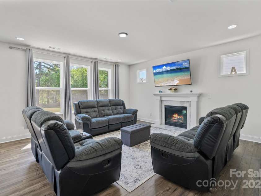184 Tetcott Street, Mooresville, NC 28115.  MLS# CAR4246979, YatesRealty ID 7848. Great Room w/ Gas Fireplace