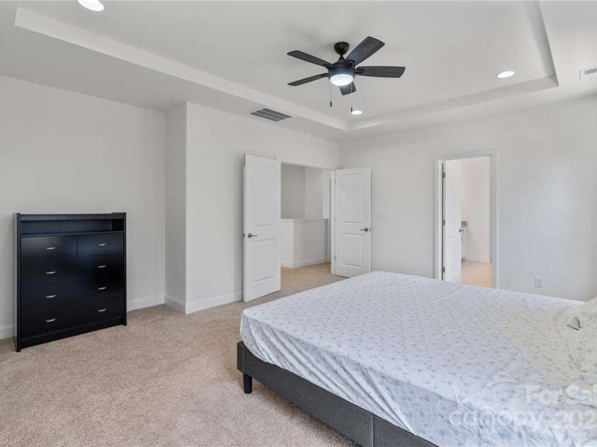 184 Tetcott Street, Mooresville, NC 28115.  MLS# CAR4246979, YatesRealty ID 7848. Primary Suite