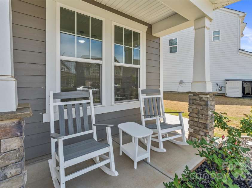 184 Tetcott Street, Mooresville, NC 28115.  MLS# CAR4246979, YatesRealty ID 7848. Rocking Chair Front Porch