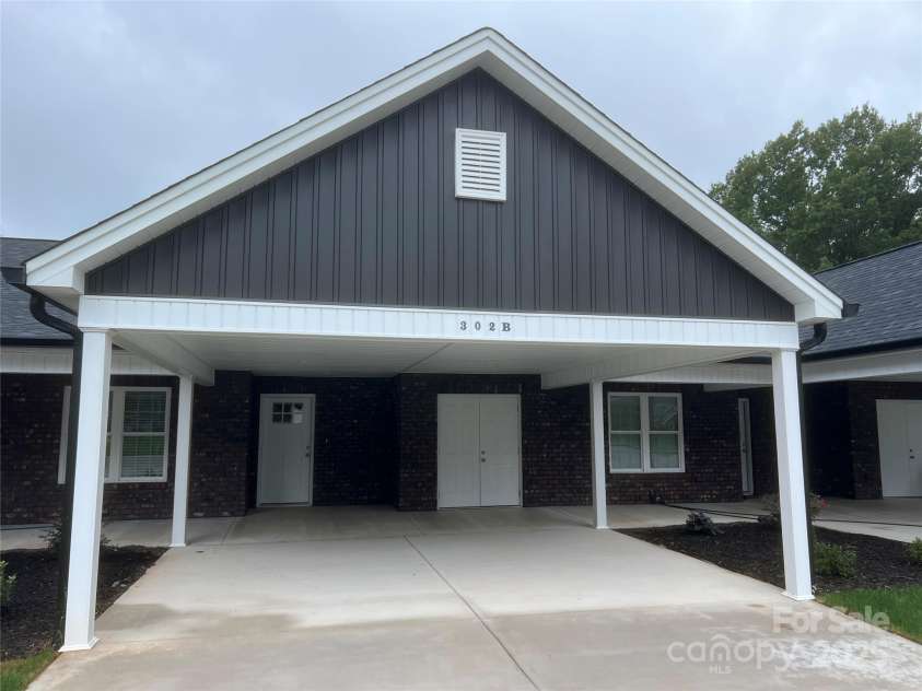 302 Boyd Street, Maiden, NC 28650.  MLS# CAR4291266, YatesRealty ID 7849. Unit B Attached Carport