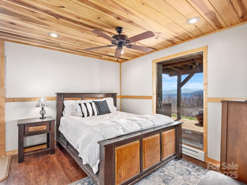 21 Carolina Sunset Pass, Asheville, NC 28804.  MLS# CAR4238184, YatesRealty ID 7854. Bedroom downstairs with views
