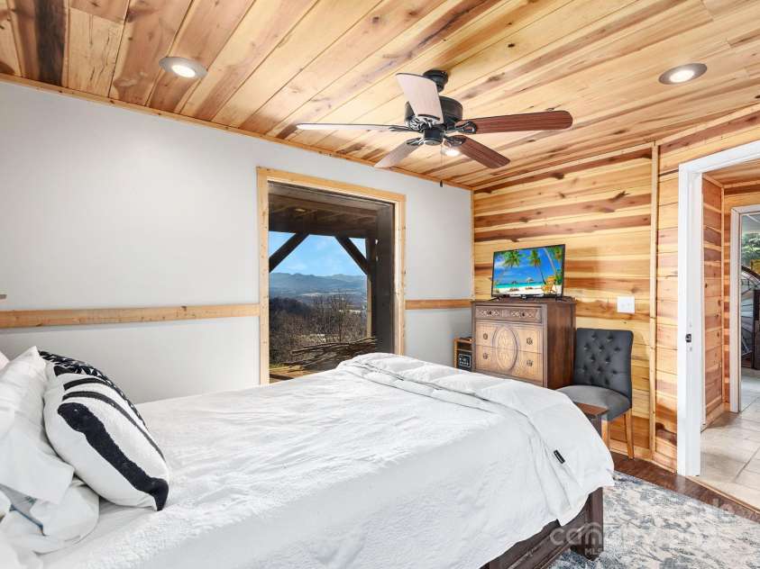 21 Carolina Sunset Pass, Asheville, NC 28804.  MLS# CAR4238184, YatesRealty ID 7854. Bedroom downstairs with views