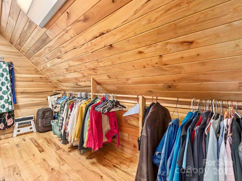 21 Carolina Sunset Pass, Asheville, NC 28804.  MLS# CAR4238184, YatesRealty ID 7854. Primary bedroom closet with additional space in the back area!