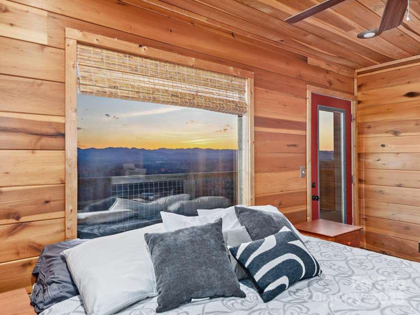 21 Carolina Sunset Pass, Asheville, NC 28804.  MLS# CAR4238184, YatesRealty ID 7854. Sunset in primary bedroom