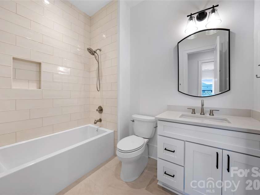 5034 Gilchrist Road, Charlotte, NC 28211.  MLS# CAR4244515, YatesRealty ID 7860. Hall Bathroom for Representation