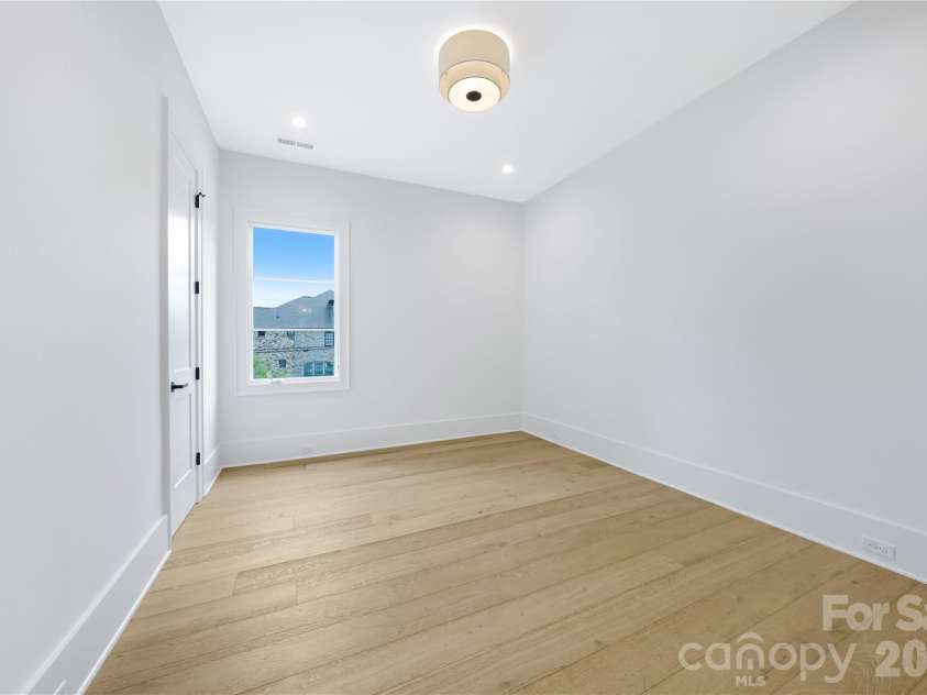 5034 Gilchrist Road, Charlotte, NC 28211.  MLS# CAR4244515, YatesRealty ID 7860. Hall Bedroom for Representation