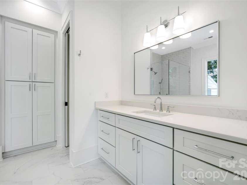 5034 Gilchrist Road, Charlotte, NC 28211.  MLS# CAR4244515, YatesRealty ID 7860. Primary Bathroom Up or Representation