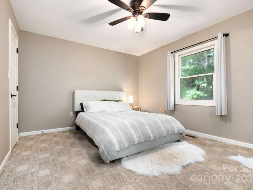 101 Timberleaf Court, Fletcher, NC 28732.  MLS# CAR4294041, YatesRealty ID 7866. Large Primary Bedroom with ceiling fan