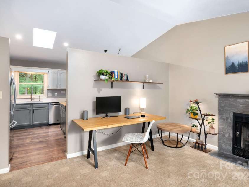 101 Timberleaf Court, Fletcher, NC 28732.  MLS# CAR4294041, YatesRealty ID 7866. Living room opens to Kitchen