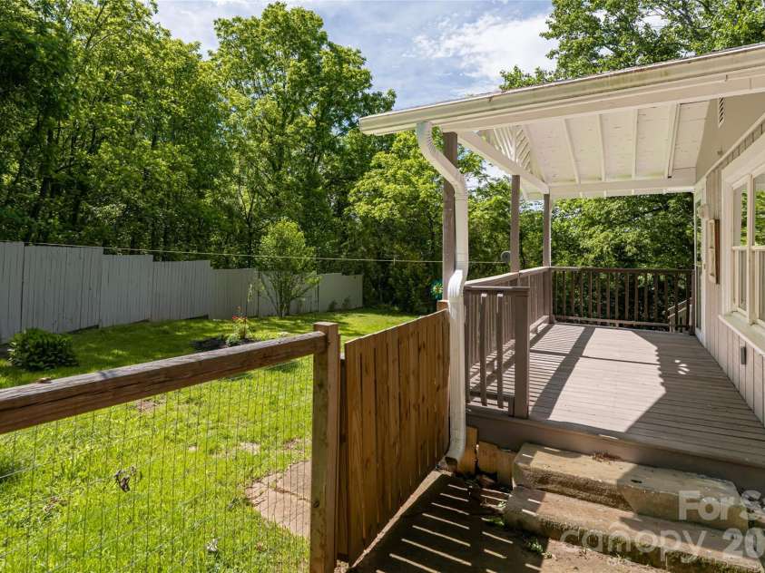 345 Lower Grassy Branch Road, Asheville, NC 28805.  MLS# CAR4364075, YatesRealty ID 7867. Back of home