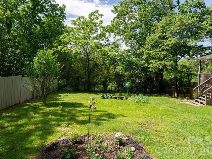 345 Lower Grassy Branch Road, Asheville, NC 28805.  MLS# CAR4364075, YatesRealty ID 7867. Backyard 