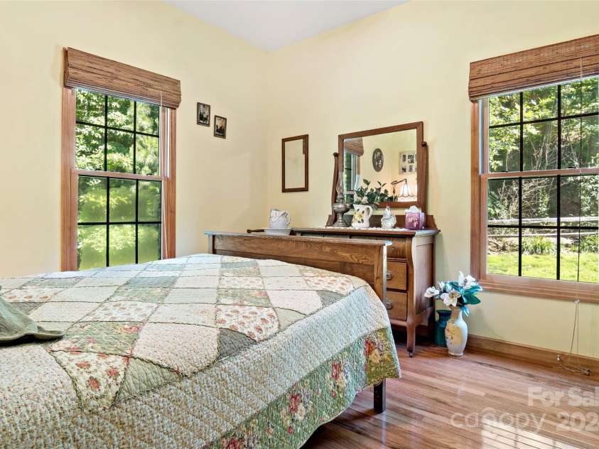 967 Clear Water Drive, Nebo, NC 28761.  MLS# CAR4147969, YatesRealty ID 7868. Main floor second bath. Light, airy, and with it's own WIC.
