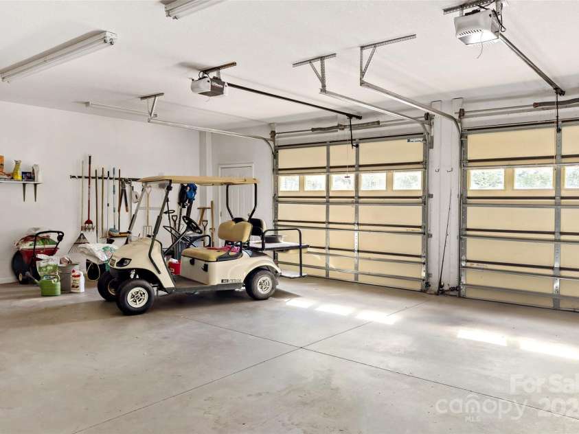 967 Clear Water Drive, Nebo, NC 28761.  MLS# CAR4147969, YatesRealty ID 7868. That takes us to the basement garage. Two-car  and lots of good space.
