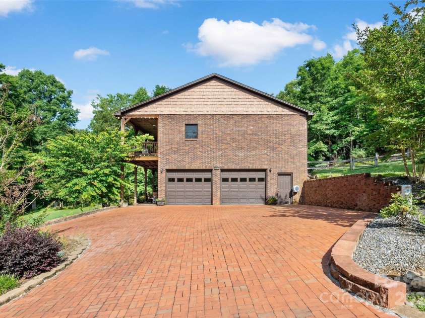 967 Clear Water Drive, Nebo, NC 28761.  MLS# CAR4147969, YatesRealty ID 7868. This bricked circle driveway is a fitting entrance to this well-built, comfortable home