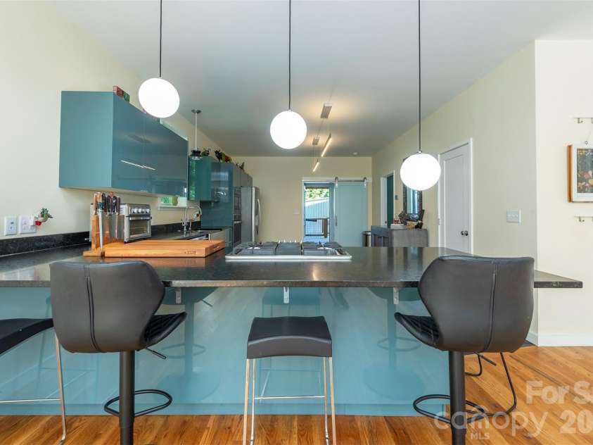 84 West Street, Weaverville, NC 28787.  MLS# CAR4334838, YatesRealty ID 7876. Breakfast Bar > Kitchen