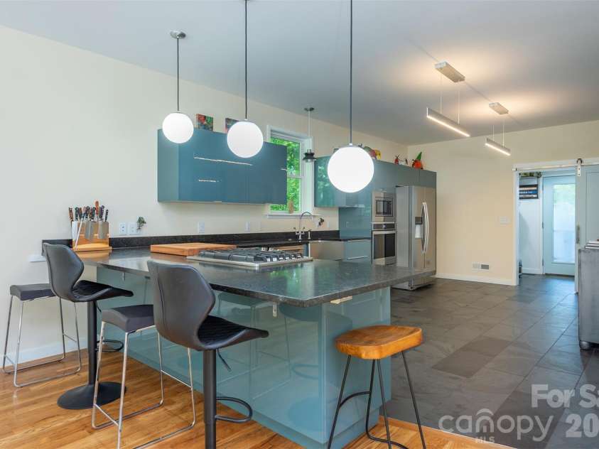 84 West Street, Weaverville, NC 28787.  MLS# CAR4334838, YatesRealty ID 7876. Breakfast Bar > Kitchen