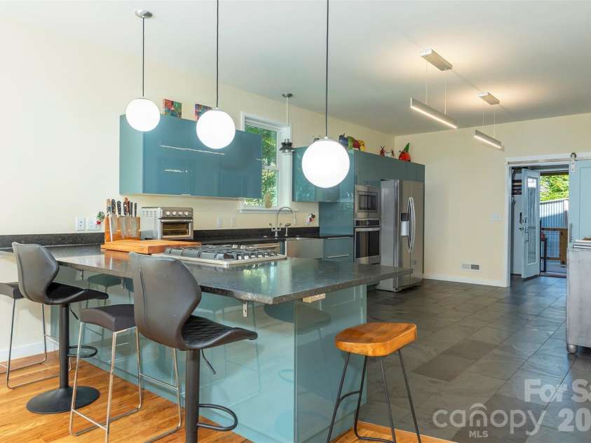 84 West Street, Weaverville, NC 28787.  MLS# CAR4334838, YatesRealty ID 7876. Perfect Entertaining Kitchen