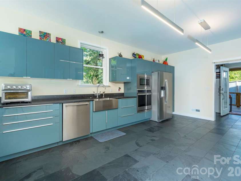 84 West Street, Weaverville, NC 28787.  MLS# CAR4334838, YatesRealty ID 7876. Sleek Cabinets