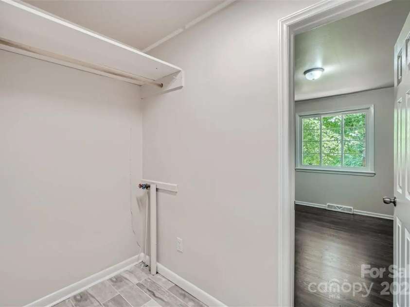 3210 Marlborough Road, Charlotte, NC 28208.  MLS# CAR4322813, YatesRealty ID 788. Laundry + Walk-in Closet