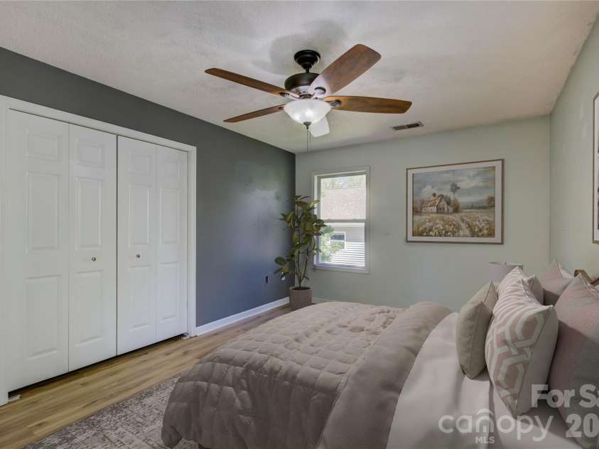 117 Pratt Street, Belmont, NC 28012.  MLS# CAR4361310, YatesRealty ID 7886. Virtually staged primary bedroom