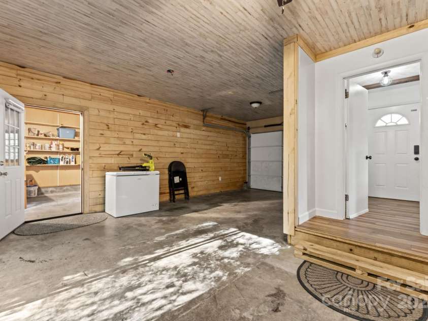 621 Kitchens Branch Road, Sylva, NC 28779.  MLS# CAR4318582, YatesRealty ID 7887. Garage bay one