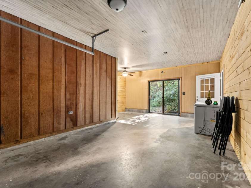 621 Kitchens Branch Road, Sylva, NC 28779.  MLS# CAR4318582, YatesRealty ID 7887. Garage bay one