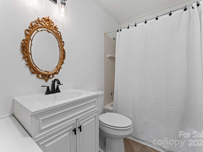 621 Kitchens Branch Road, Sylva, NC 28779.  MLS# CAR4318582, YatesRealty ID 7887. Hallway bathroom