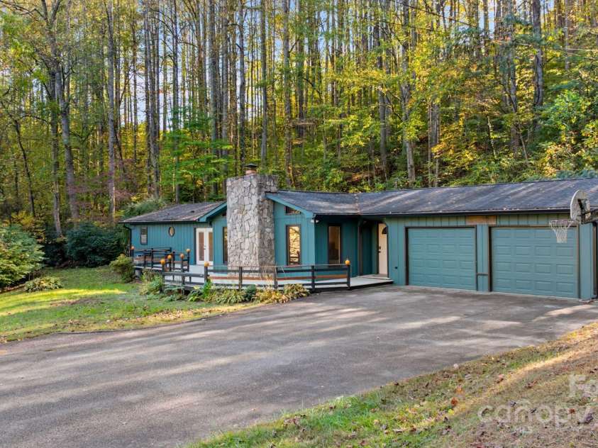 621 Kitchens Branch Road, Sylva, NC 28779.  MLS# CAR4318582, YatesRealty ID 7887. Home from the side yard
