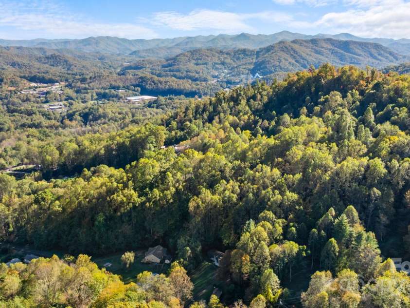 621 Kitchens Branch Road, Sylva, NC 28779.  MLS# CAR4318582, YatesRealty ID 7887. Long range view from front yard