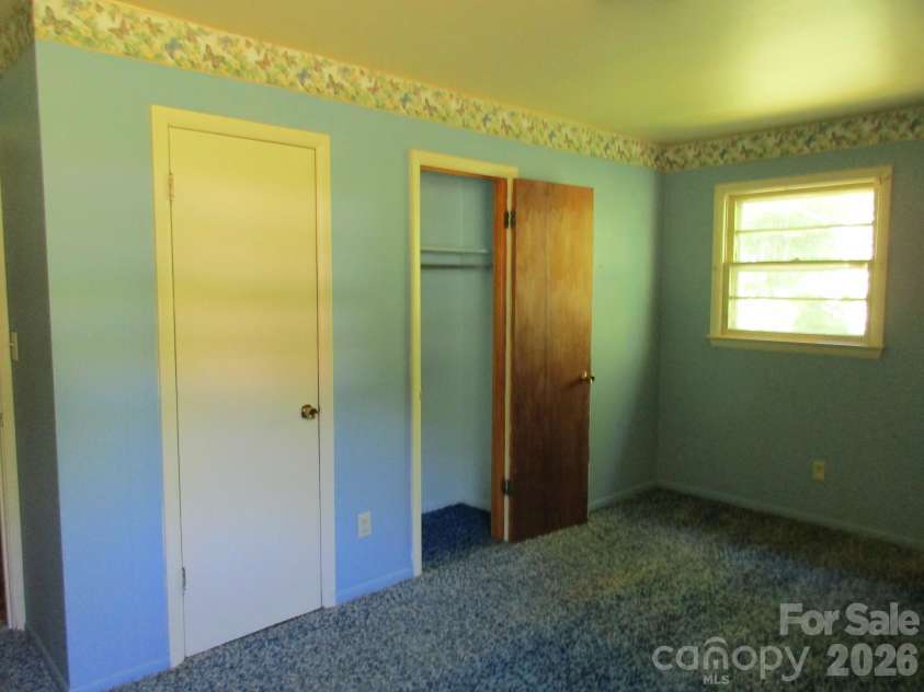 225 Davis Road, Crumpler, NC 28617.  MLS# CAR4349380, YatesRealty ID 7889. 