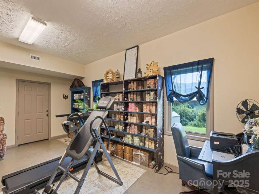 153 Trinity Drive, Clyde, NC 28721.  MLS# CAR4240321, YatesRealty ID 7894. 