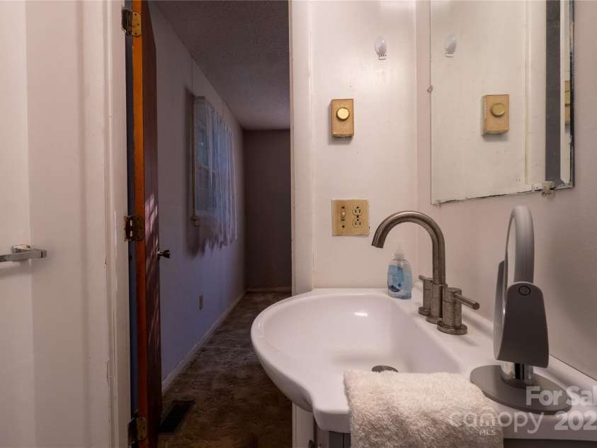 3581 Thompson Street, Newton, NC 28658.  MLS# CAR4219105, YatesRealty ID 790. Half bathroom