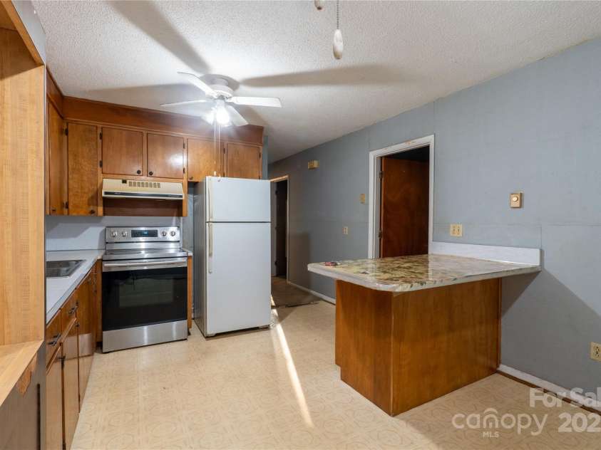 3581 Thompson Street, Newton, NC 28658.  MLS# CAR4219105, YatesRealty ID 790. Kitchen area